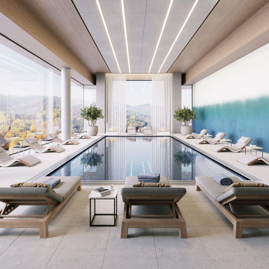 Interiorer Wellness-Poolbereich mit hellen Holzliegen, großen Glasfenstern, blauem Wandteil und Blick auf die umliegende Landschaft; Hue Winter Light von k'moor walldesign