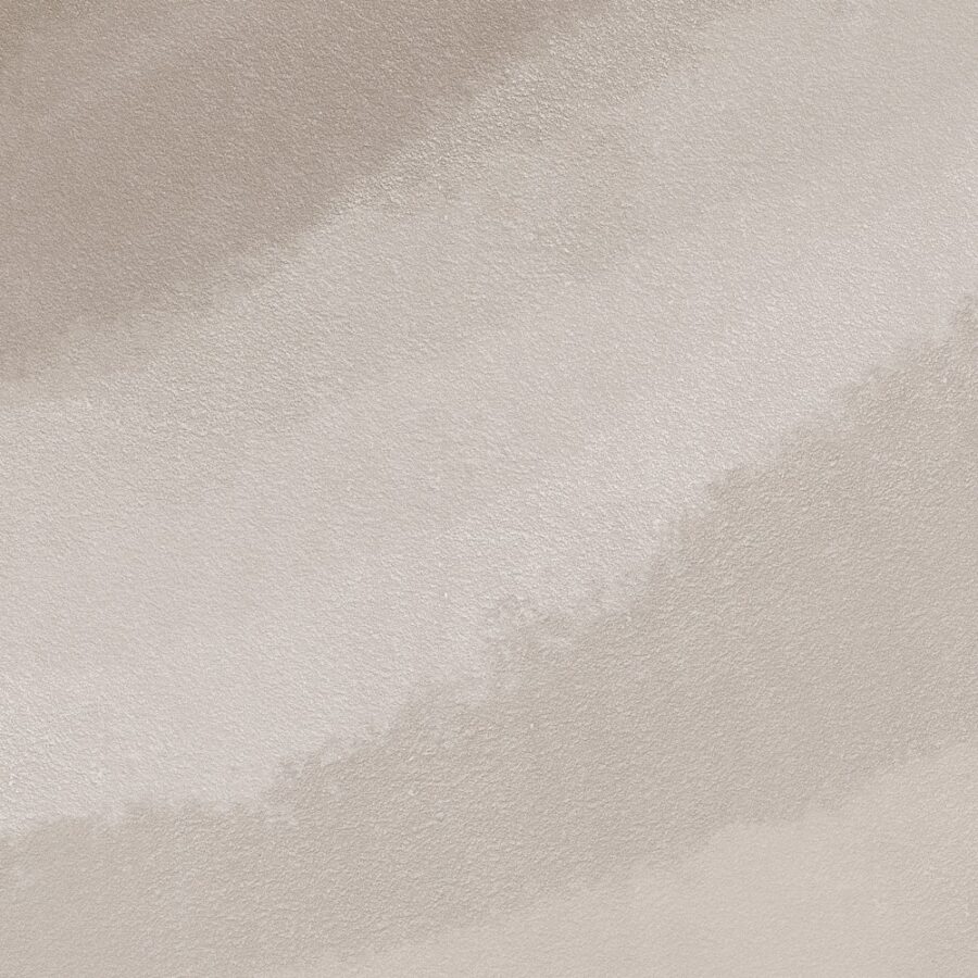A soft beige textured surface with subtle misty shading appears in the 1 m Mist over Mesa Brown wall design sample.